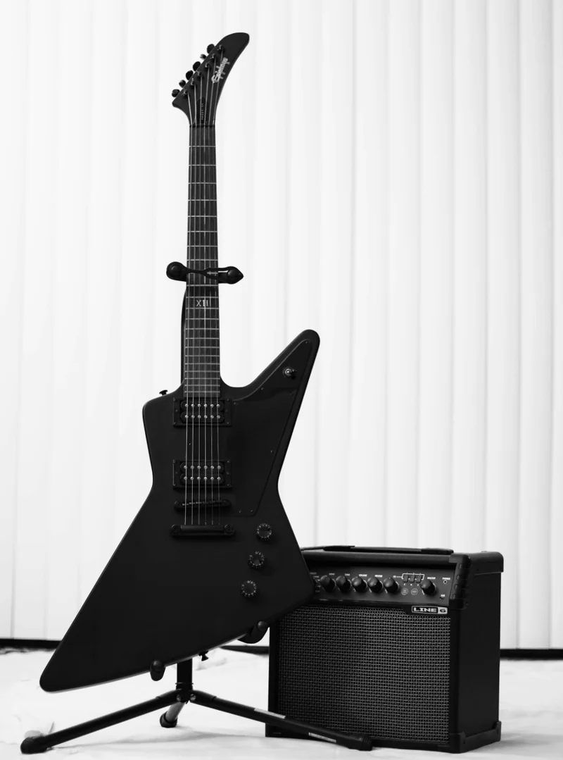 Electric guitar, amplifier and instrument stand